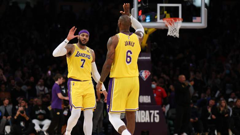 LeBron James and Carmelo Anthony celebrate during a Los Angeles Lakers game
