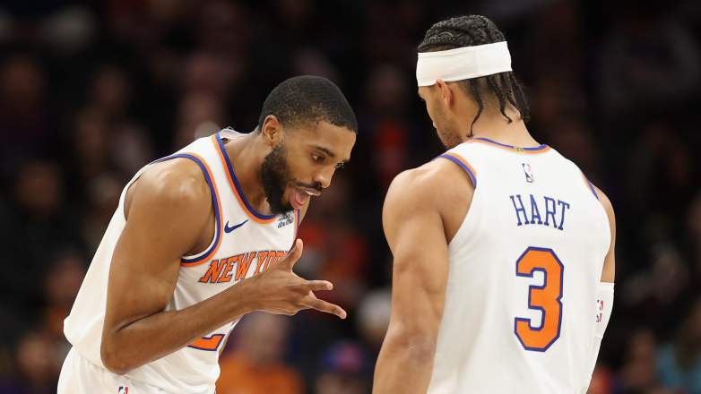 Mikal Bridges of the New York Knicks celebrates a three-point shot with Josh Hart.