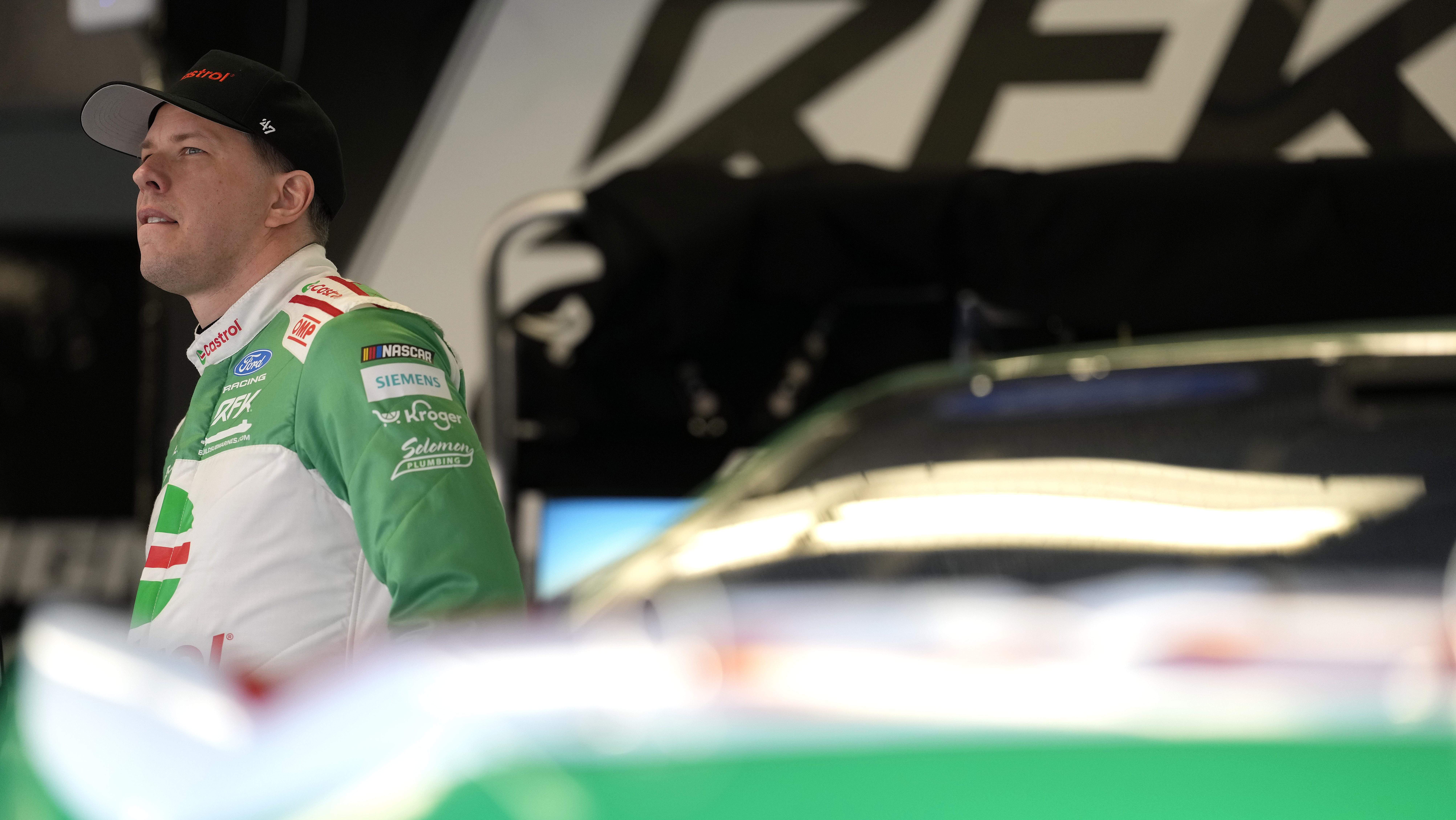 NASCAR Cup Series champion Brad Keselowski in his racing gear.