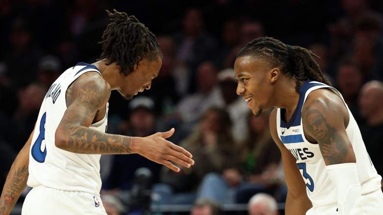 Bones Hyland of the Minnesota Timberwolves celebrates with teammate Ayo Dosunmu