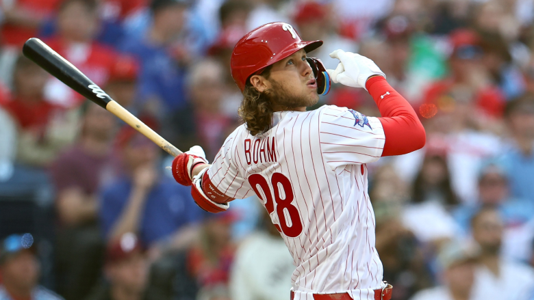 Alec Bohm #28 of the Philadelphia Phillies hits a three-run home run in the fifth inning against the Texas Rangers on Opening Day at Citizens Bank Park on March 26, 2026 in Philadelphia, Pennsylvania. (Photo by Emilee Chinn/Getty Images)