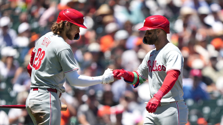 Bryce Harper #3 of the Philadelphia Phillies is congratulated by Alec Bohm #28 after Harper hit a solo home run against the San Francisco Giants in the top of the fourth inning at Oracle Park on July 09, 2025 in San Francisco, California. (Photo by Thearon W. Henderson/Getty Images)