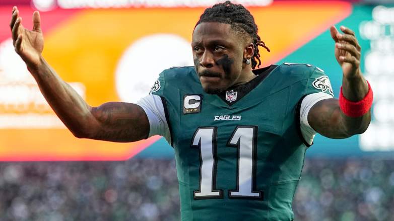 A.J. Brown gestures as an insider reports he will be traded to the Patriots.