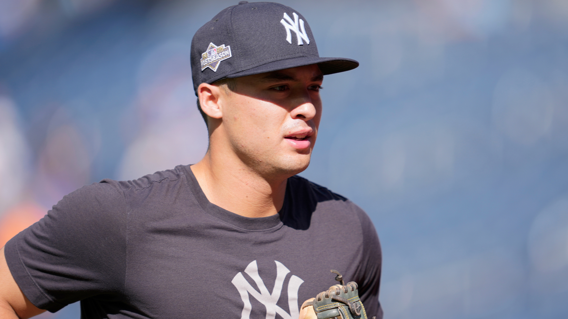Anthony Volpe #11 of the New York Yankees warms up before game two against the Toronto Blue Jays of the American League or National League Division Series at Rogers Centre on October 05, 2025 in Toronto, Ontario. (Photo by Mark Blinch/Getty Images)