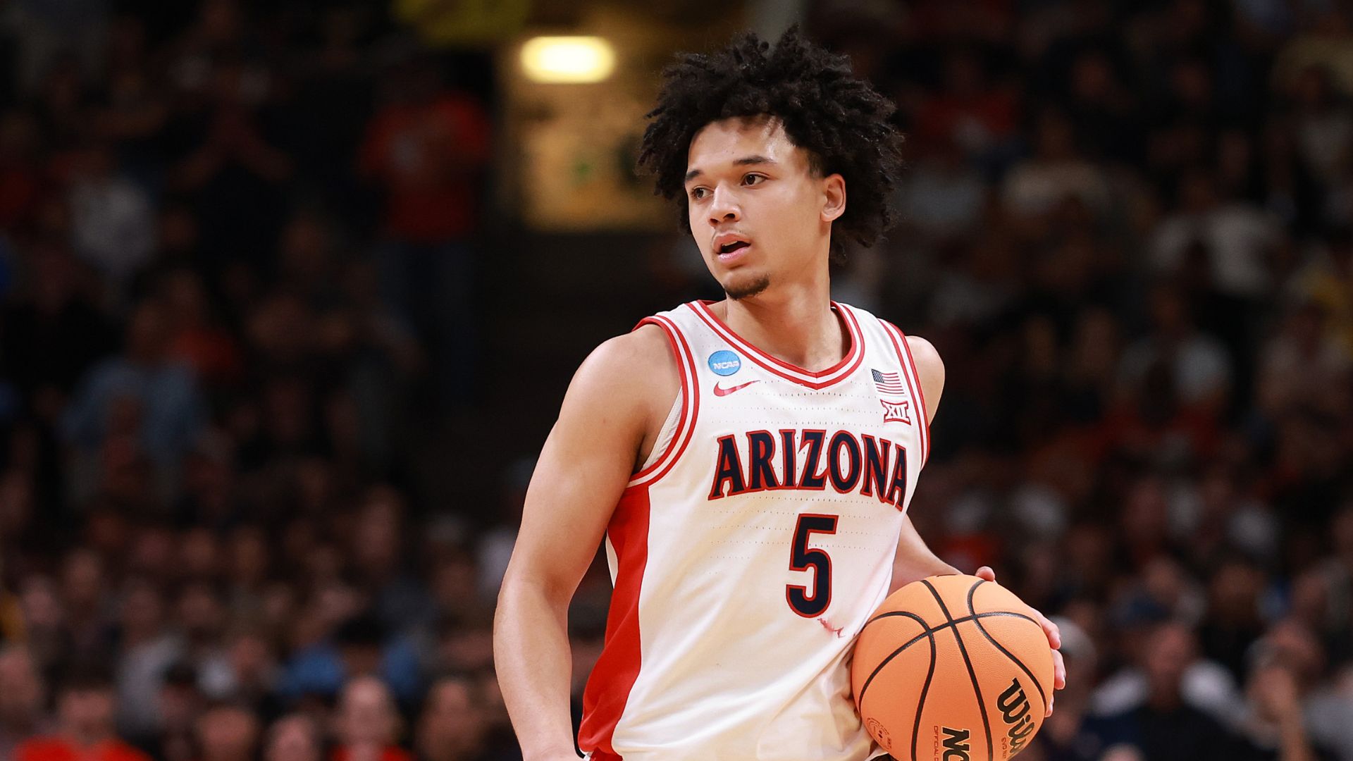 Brayden Burries #5 of the Arizona Wildcats looks \on during the second half of a game against the Purdue Boilermakers in the Elite Eight of the 2026 NCAA Men's Basketball Tournament at SAP Center on March 28, 2026