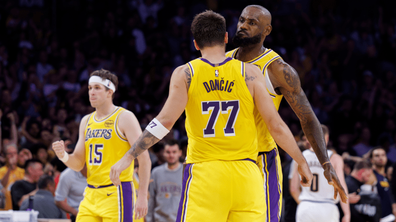 Austin Reaves, Luka Doncic and LeBron James