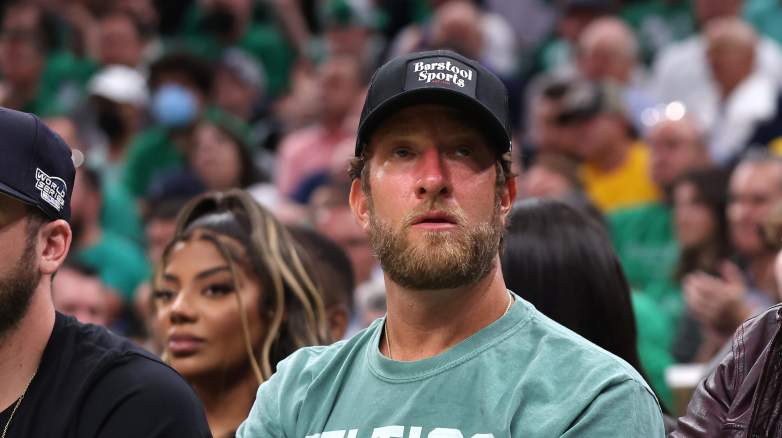 Dave Portnoy sitting courtside at TD Garden during the 2022 NBA Finals