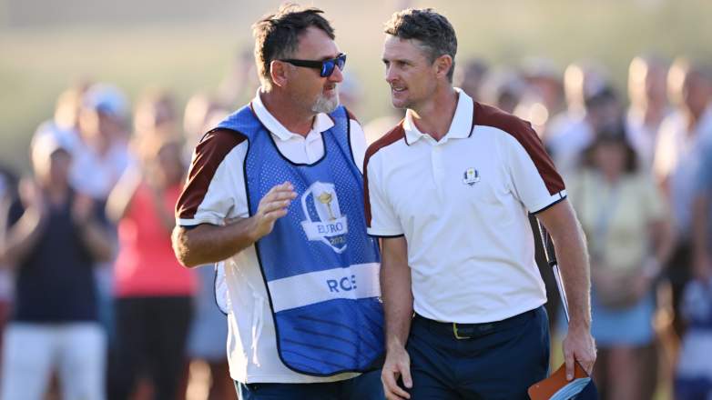 Justin Rose walks with caddie Mark âFoochâ Fulcher during the 2023 Ryder Cup at Marco Simone Golf Club