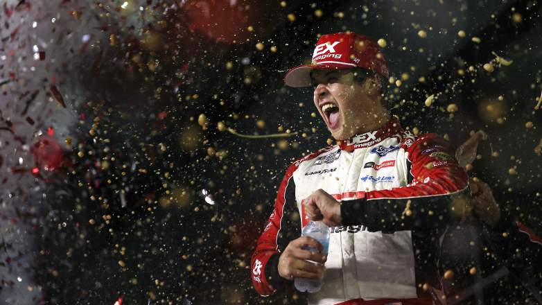 Harrison Burton celebrates in victory lane after winning a NASCAR Cup Series race at Daytona