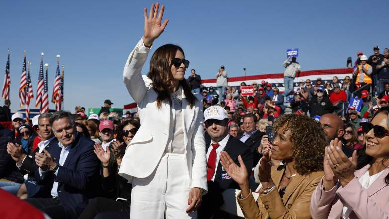 Danica Patrick waves to crowd at a Donald Trump campaign rally in Pennsylvania