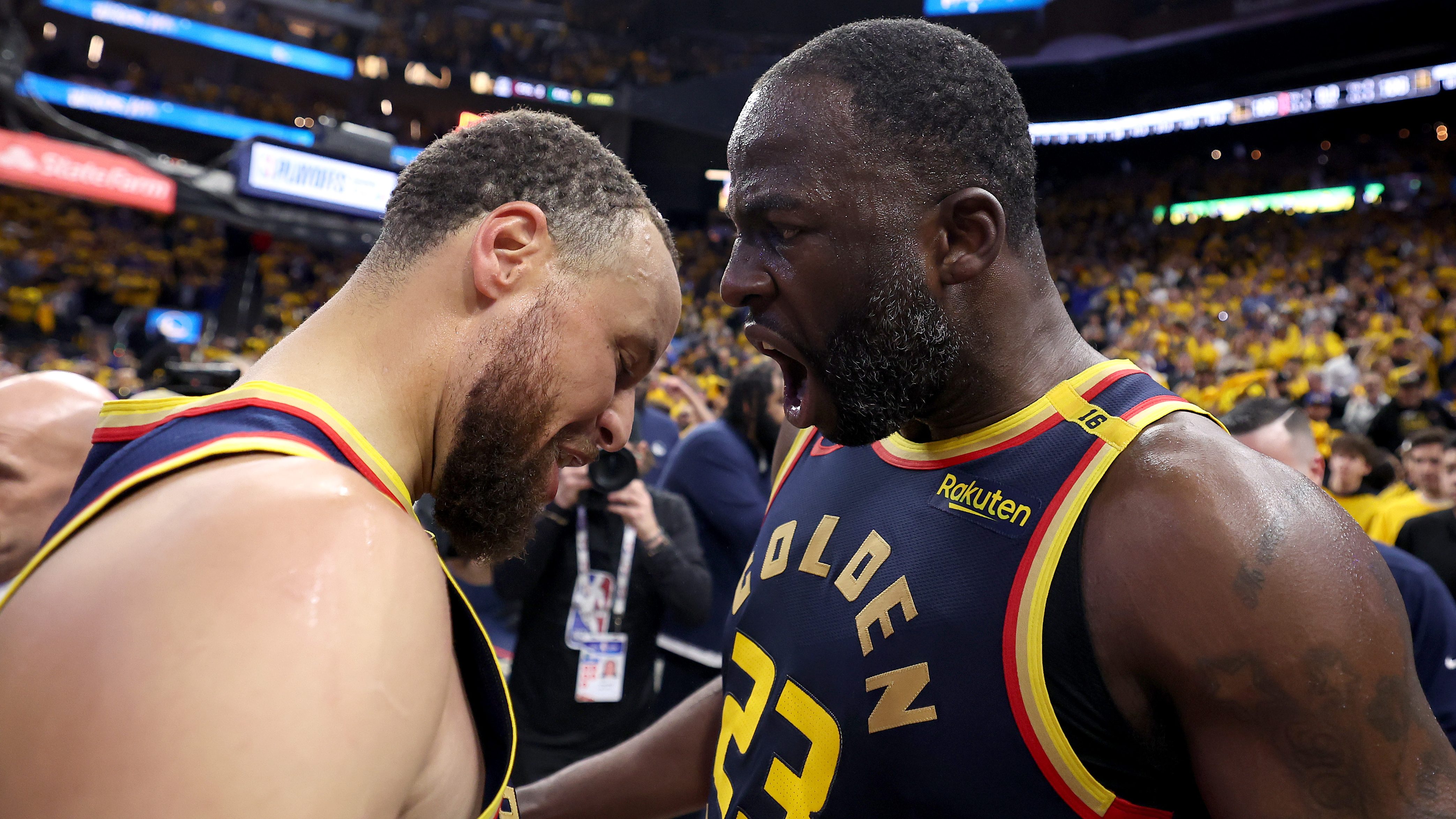Draymond Green #23 and Stephen Curry #30 of the Golden State Warriors