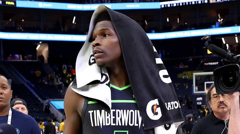 Anthony Edwards walking off court after knee injury during Timberwolves playoff game