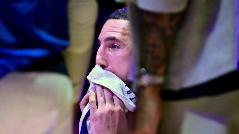 Klay Thompson reacts on Mavericks bench during game