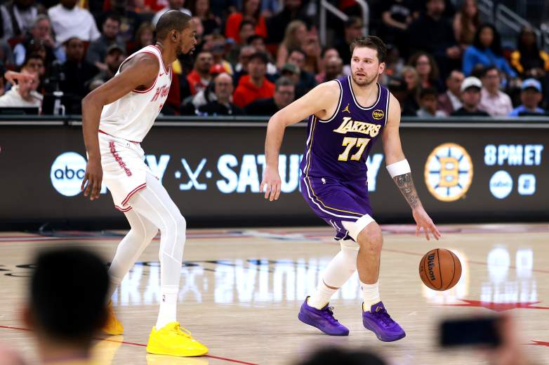 Kevin Durant #7 of the Houston Rockets defends Luka Doncic #77 of the Los Angeles Lakers