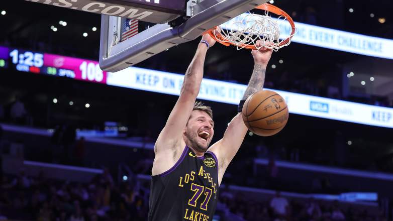 Luka Dončić dunks during Lakers game against Cleveland Cavaliers at Crypto.com Arena