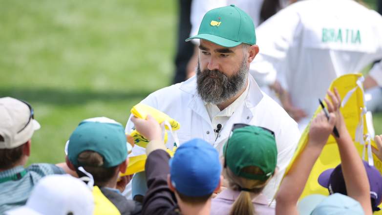 Jason Kelce signs autographs for patrons during the 2026 Masters Par 3 Contest at Augusta National