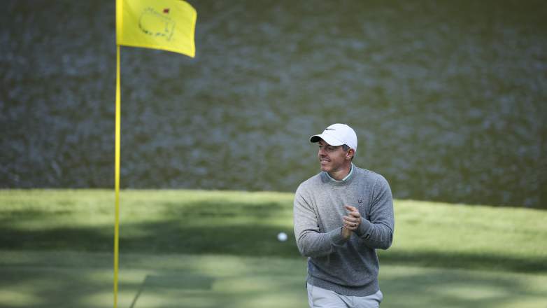 Rory McIlroy reacts near the flag during the Par 3 Contest at Augusta National ahead of the 2026 Masters