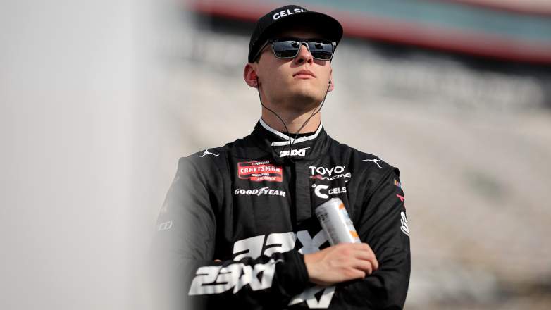 Corey Heim stands during qualifying at Bristol Motor Speedway