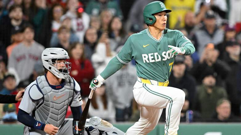 Masataka Yoshida swings during a walk-off at-bat for the Red Sox against the Tigers at Fenway Park