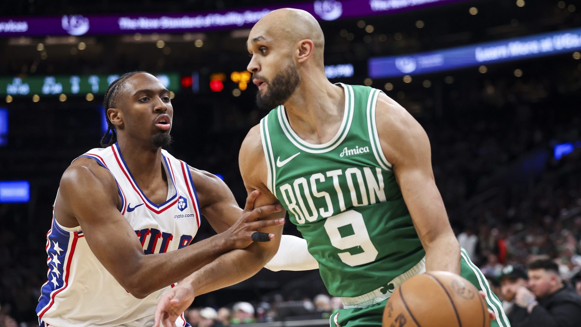 Derrick White dribbles past a Philadelphia 76ers defender during Celtics Game 2 playoff loss