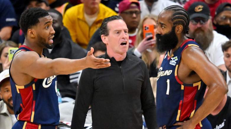 Donovan Mitchell and James Harden talk with coach during Cavaliers playoff game vs Raptors