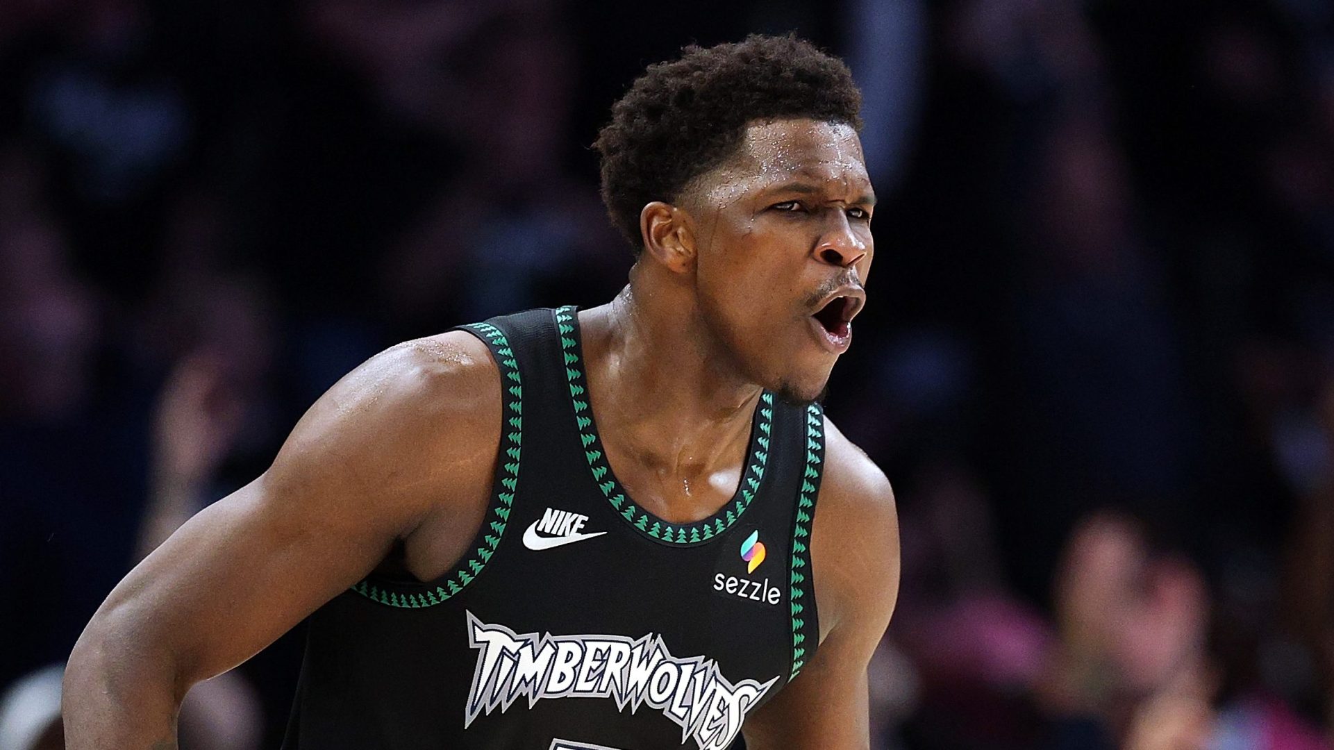 Timberwolves star Anthony Edwards reacts during game before knee MRI results