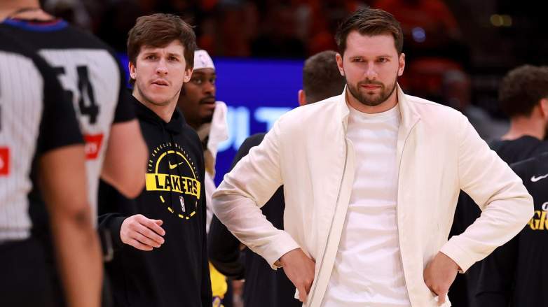 Luka Doncic stands on Lakers bench during Game 3 against Rockets while sidelined with injury