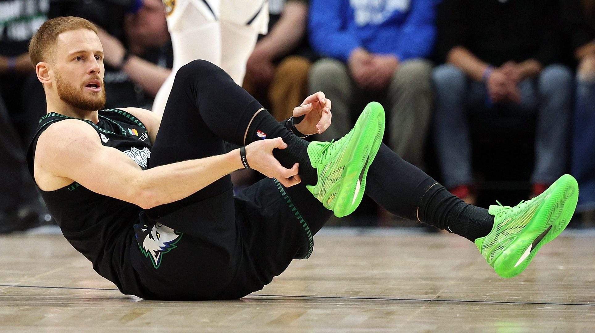 Donte DiVincenzo reacts after suffering Achilles injury during Timberwolves playoff game