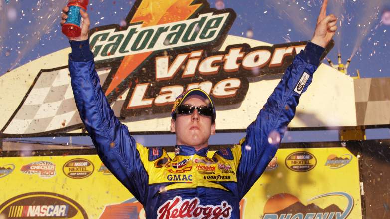 Kyle Busch celebrates after winning his first NASCAR Cup Series race at Phoenix International Raceway in 2005