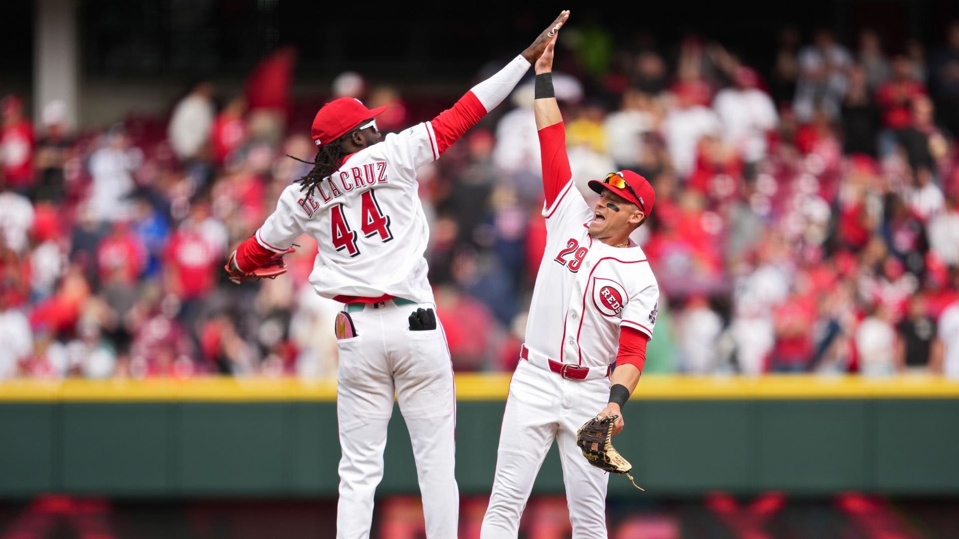 Elly de la Cruz #44 of the Cincinnati Reds celebrates with teammate TJ Friedl #29 following a baseball game against the Boston Red Sox at Great American Ball Park on March 29, 2026 in Cincinnati, Ohio.