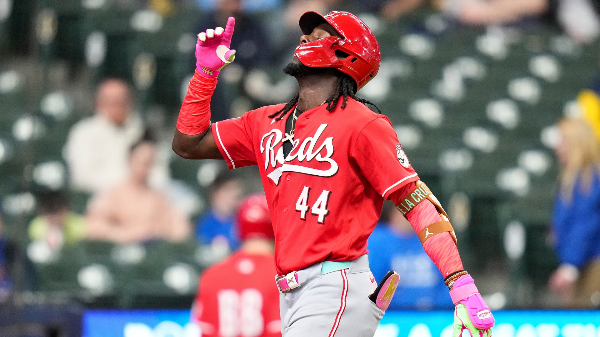 Elly de la Cruz #44 of the Cincinnati Reds celebrates his solo home run at the plate against the Milwaukee Brewers in the sixth inning of an exhibition game at American Family Field on March 24, 2026 in Milwaukee, Wisconsin.