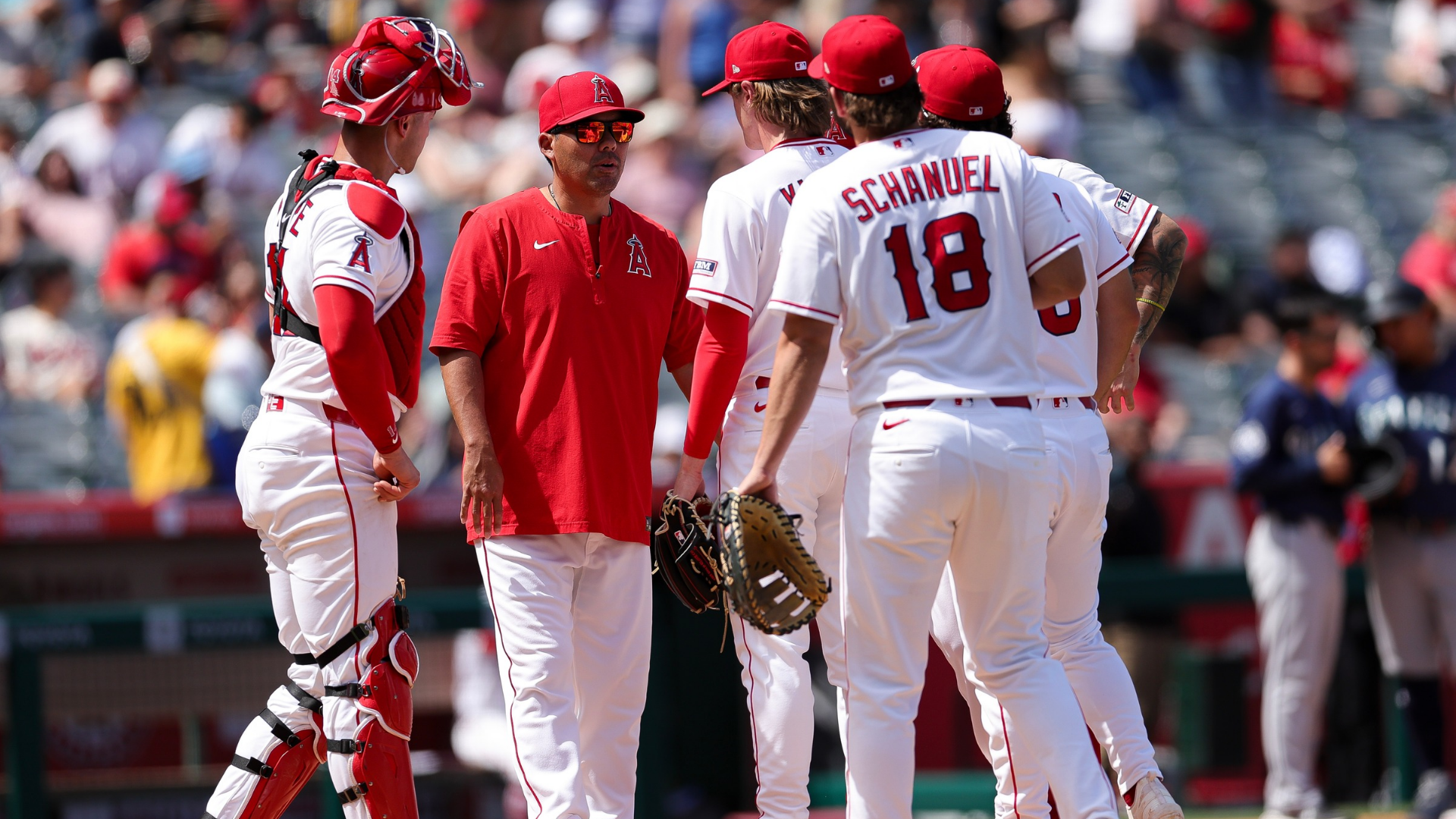 Kurt Suzuki of the Los Angeles Angels makes a mound visit to relieve George Klassen #58 during the third inning of a baseball game against the Seattle Mariners at Angel Stadium of Anaheim on April 05, 2026 in Anaheim, California. (Photo by Ryan Sirius Sun/Getty Images)