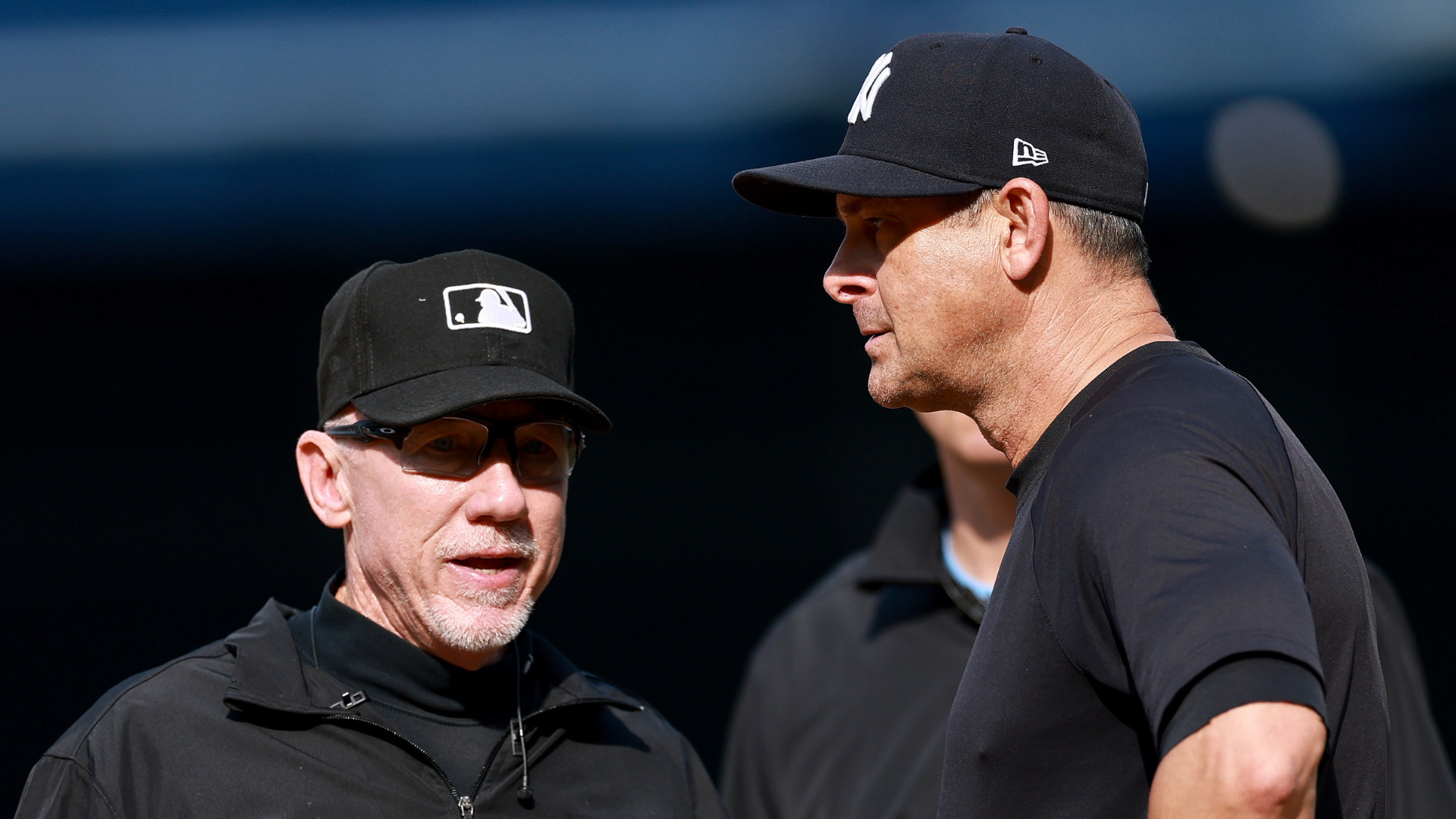 Manager Aaron Boone #17 of the New York Yankees discusses a call with umpire Lance Barksdale #23 at the top of the ninth inning against the Los Angeles Angels at Yankee Stadium on April 16, 2026 in The Bronx borough of New York City. Boone was thrown out of the game in the ninth by home plate umpire Will Little. The Los Angeles Angels defeated the New York Yankees 11-4. (Photo by Elsa/Getty Images)