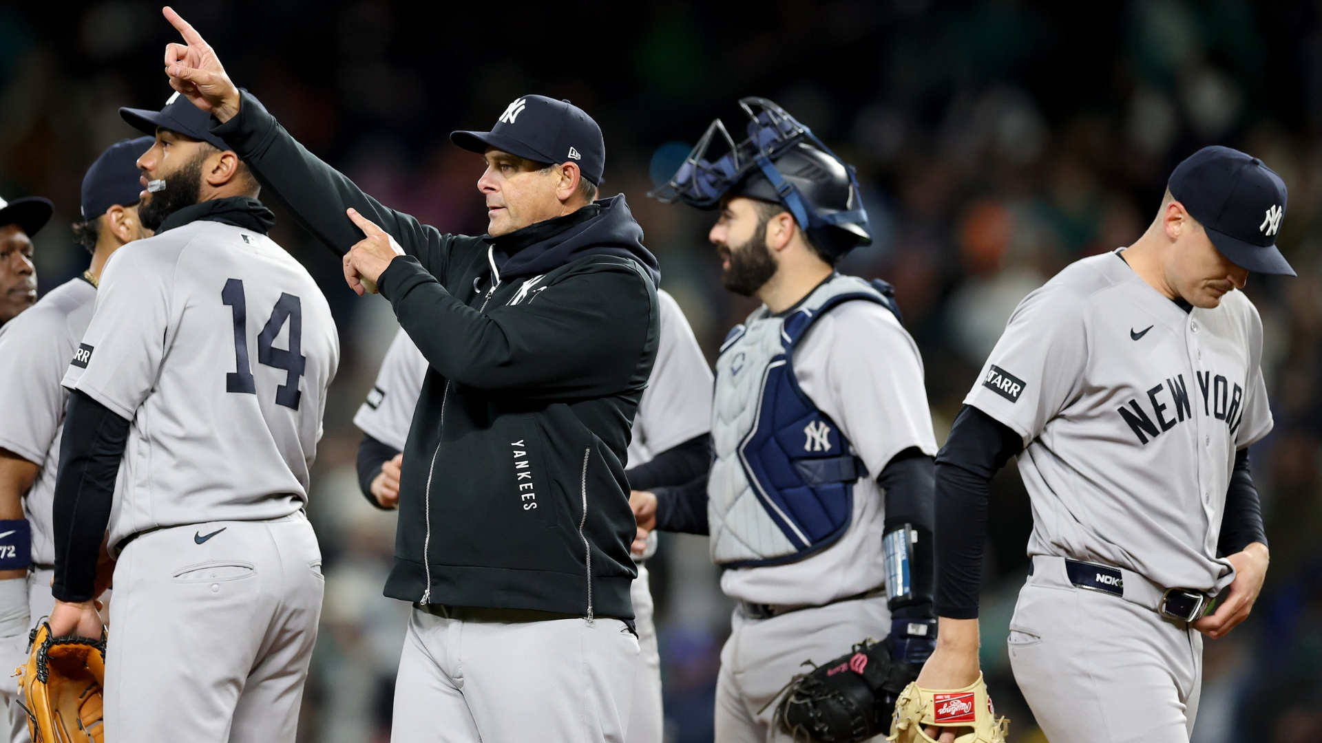 Manager Aaron Boone of the New York Yankees signals for a pitching change against the Seattle Mariners at T-Mobile Park on March 30, 2026 in Seattle, Washington. (Photo by Steph Chambers/Getty Images)