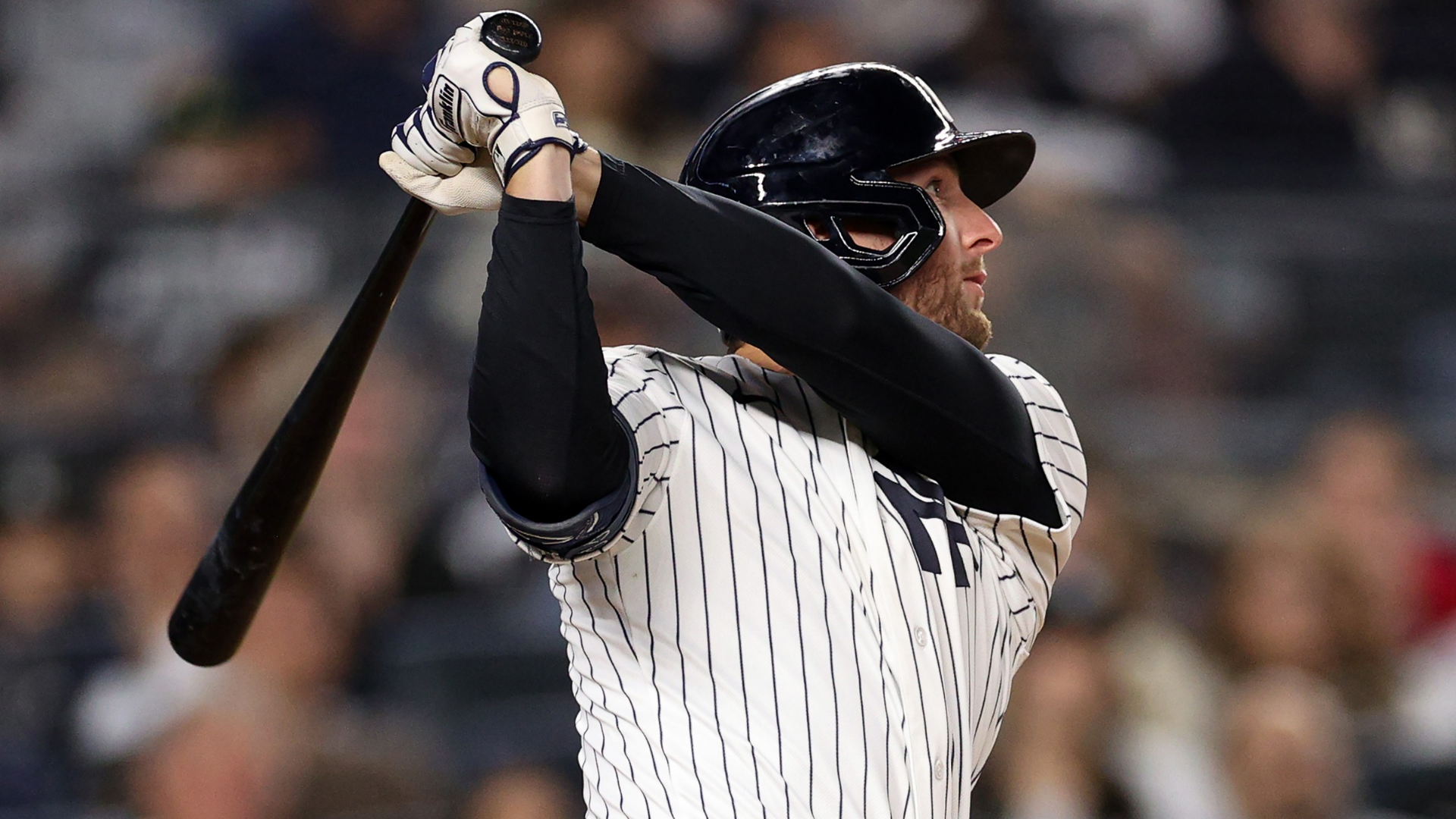 Ryan McMahon #19 of the New York Yankees watches his eighth inning two-run home run against the Kansas City Royals at Yankee Stadium on April 17, 2026 in New York City. (Photo by Evan Bernstein/Getty Images)
