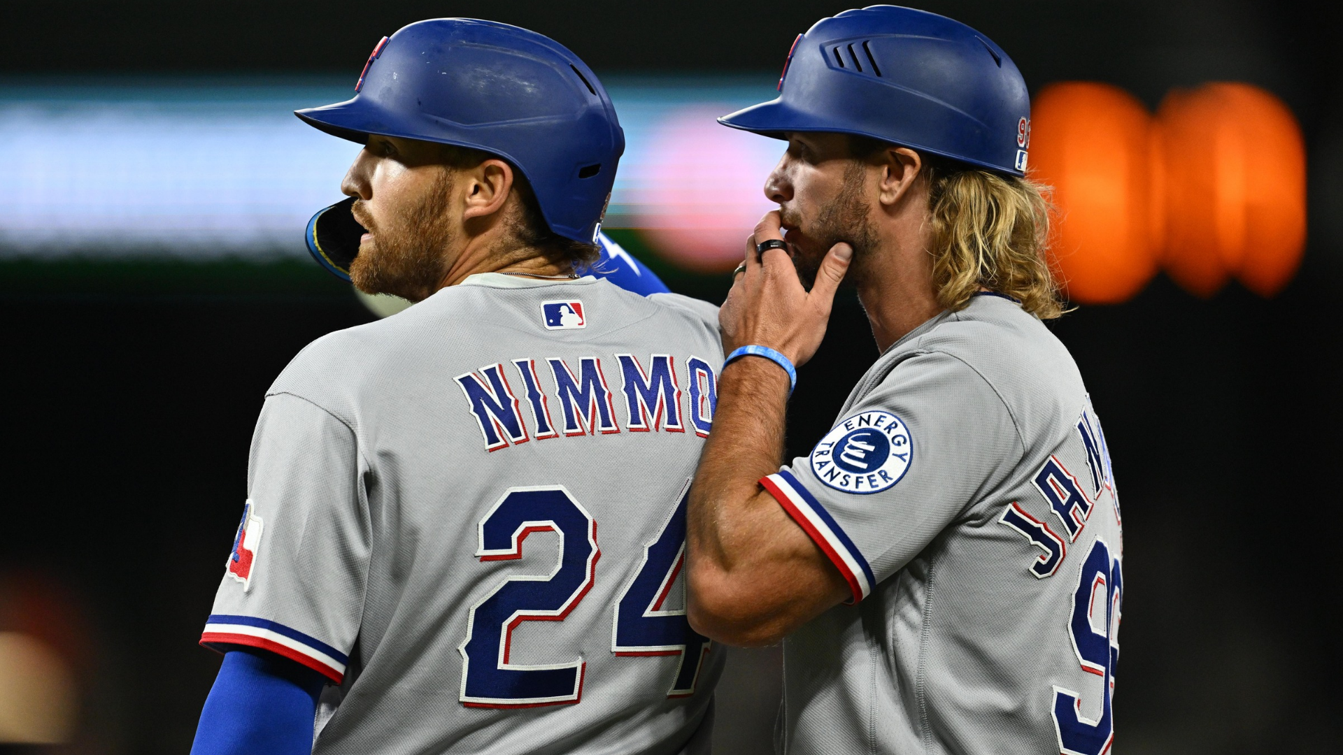 First Base Coach Travis Jankowski #96 gives instructions to Brandon Nimmo #24 in the sixth inning against the Baltimore Orioles at Oriole Park at Camden Yards on March 30, 2026 in Baltimore, Maryland. (Photo by Jamie Sabau/Getty Images)