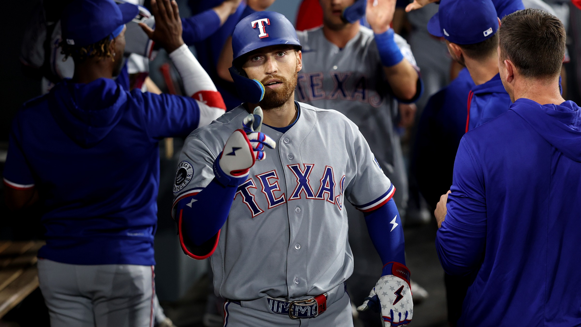Brandon Nimmo #24 of the Texas Rangers reacts after hitting a two-run home run against the Los Angeles Dodgers during the sixth inning at Dodger Stadium on April 11, 2026 in Los Angeles, California. (Photo by Luke Hales/Getty Images)