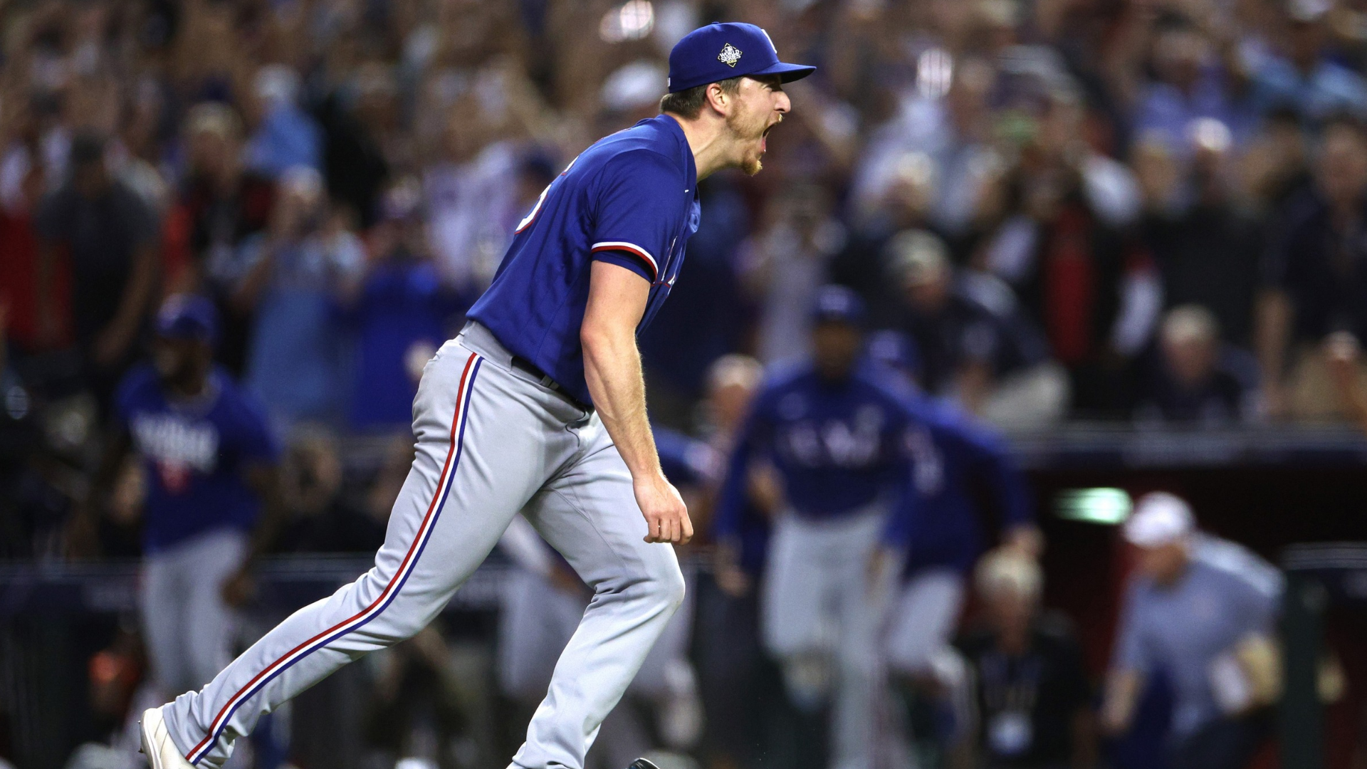 Josh Sborz #66 of the Texas Rangers celebrates after defeating the Arizona Diamondbacks 5-0 in Game Five of the World Series at Chase Field on November 01, 2023 in Phoenix, Arizona. (Photo by Harry How/Getty Images)