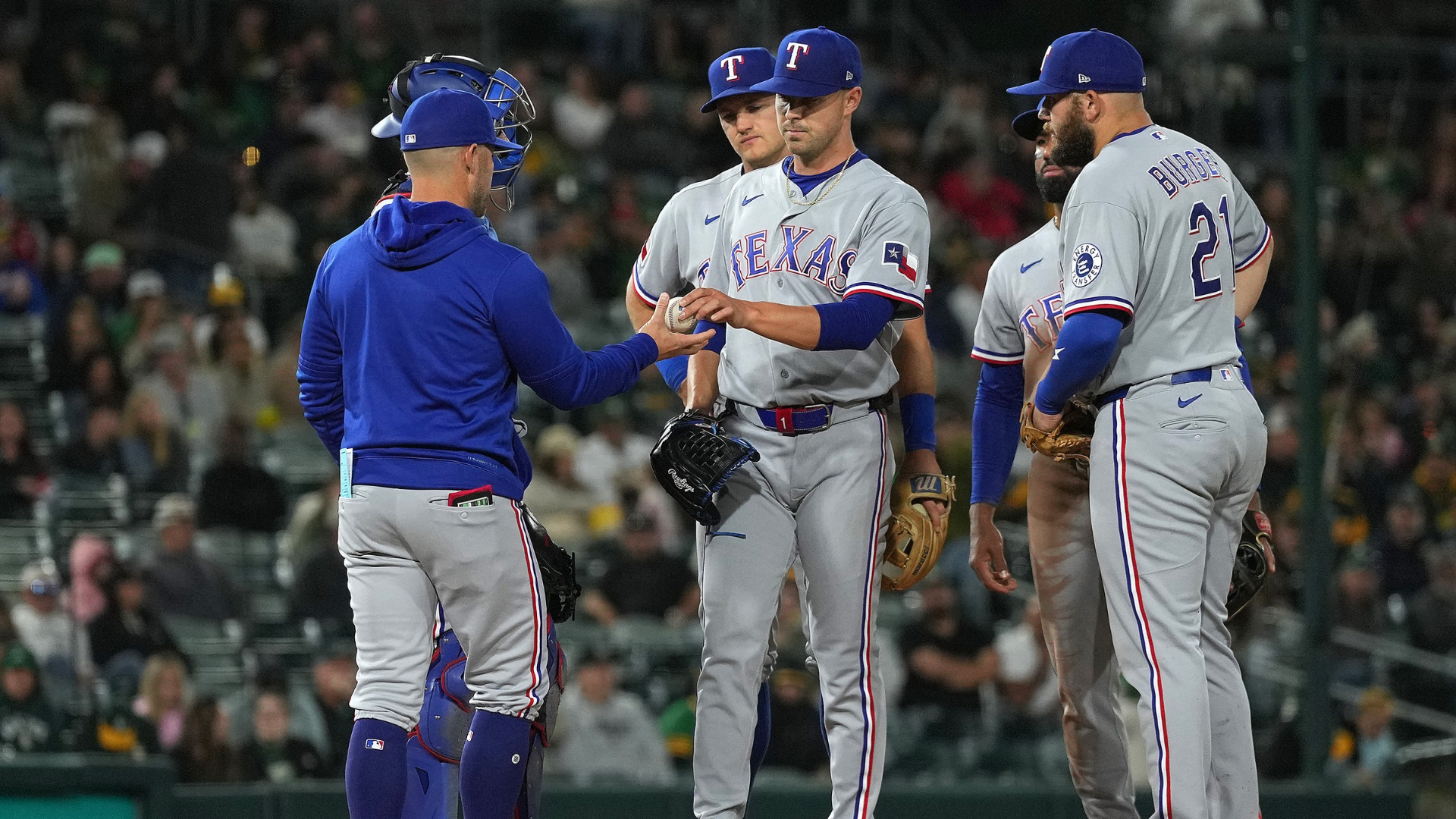 Manager Skip Schumaker #55 of the Texas Rangers takes the ball from pitcher MacKenzie Gore #1 taking Gore out of the game against the Athletics in the bottom of the fifth inning at Sutter Health Park on April 14, 2026 in Sacramento, California. (Photo by Thearon W. Henderson/Getty Images)