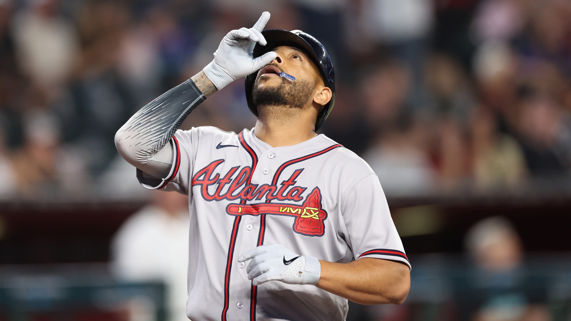 Dominic Smith #8 of the Atlanta Braves celebrates after hitting a solo home run against the Arizona Diamondbacks during the third inning at Chase Field on April 02, 2026 in Phoenix, Arizona. (Photo by Chris Coduto/Getty Images)