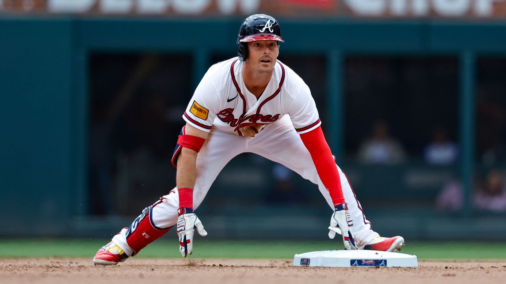 Mike Yastrzemski #18 of the Atlanta Braves slides in for a double during the seventh inning against the Kansas City Royals at Truist Park on March 29, 2026 in Atlanta, Georgia. (Photo by Todd Kirkland/Getty Images)