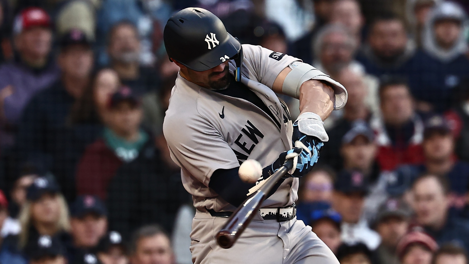 Randal Grichuk #34 of the New York Yankees splinters his bat while flying out during the fourth inning against the Boston Red Sox at Fenway Park on April 23, 2026 in Boston, Massachusetts. (Photo By Winslow Townson/Getty Images)