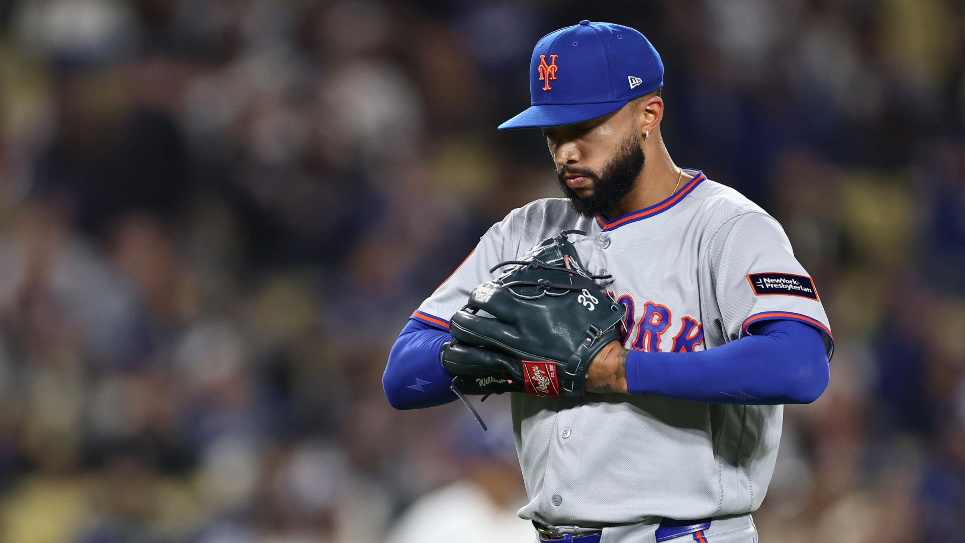 Devin Williams #38 of the New York Mets reacts as he exits the game against the Los Angeles Dodgers during the eighth inning at Dodger Stadium on April 15, 2026 in Los Angeles, California. All players are wearing the number 42 in honor of Jackie Robinson Day. (Photo by Luke Hales/Getty Images)