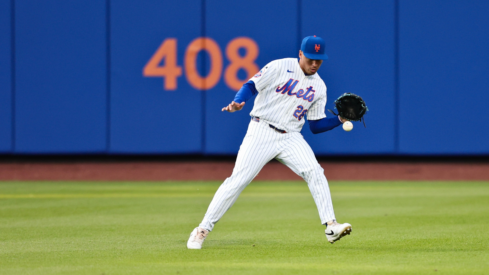 Center fielder Tyrone Taylor #28 of the New York Mets lets the ball take a bounce during the seventh inning of game two of a doubleheader against the Colorado Rockies at Citi Field on April 26, 2026 in the Queens borough of New York City. (Photo by Heather Khalifa/Getty Images)