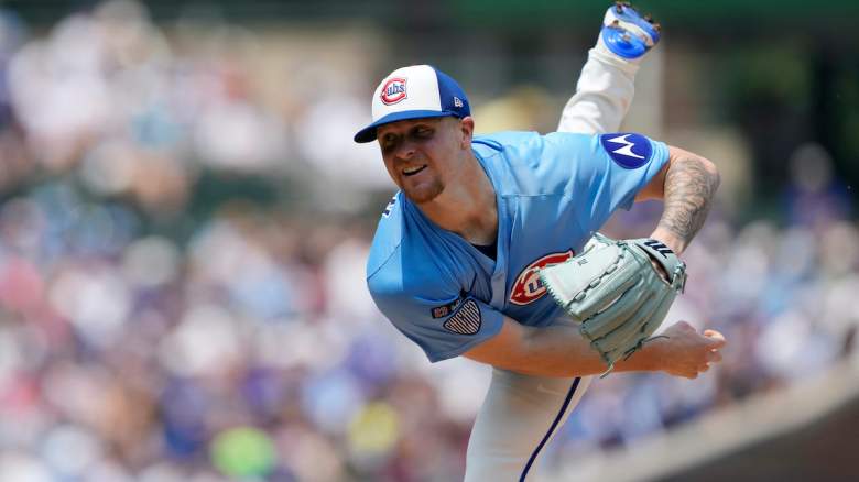 Chicago Cubs pitcher Cade Horton delivers a pitch during a game, wearing a light blue uniform.