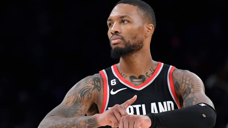 Damian Lillard of the Portland Trail Blazers gestures during an NBA game amid an injury status reveal before must-win Game 5 vs the San Antonio Spurs.