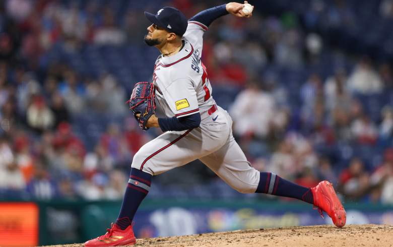 Robert Suarez pitches during MLB game as Braves evaluate bullpen options following Raisel Iglesias injury update.