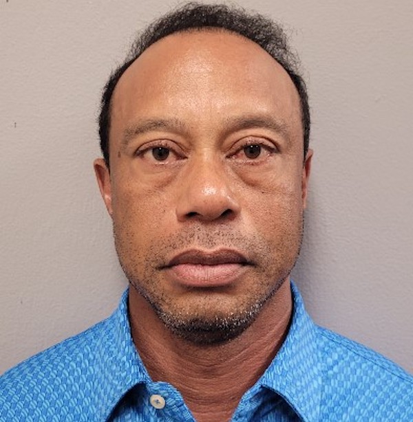 Tiger Woods poses for a mug shot.