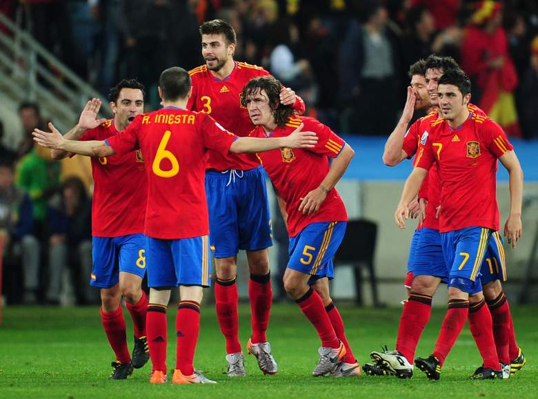 Xavi, Andres Iniesta, Gerard Pique, and Carles Puyol