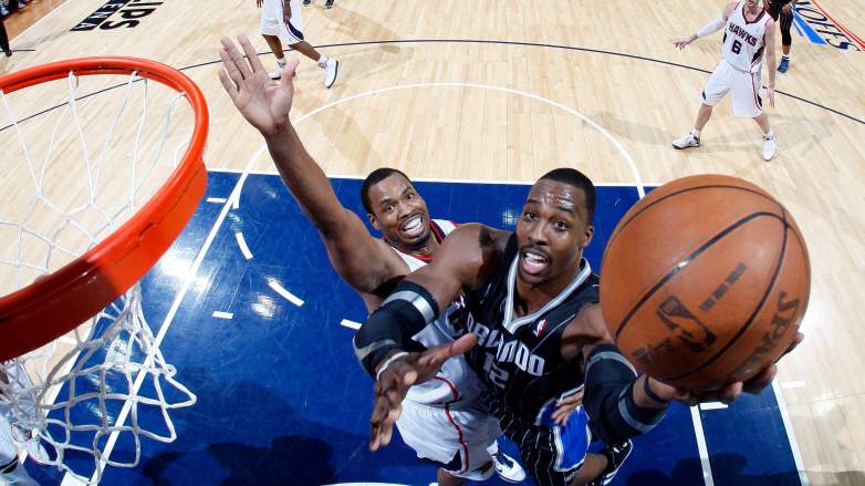 Jason Collins contests Dwight Howard at the rim during Hawks vs Magic game